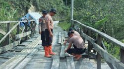 Perkuat Infrastruktur Desa, Brimob Sumut Lakukan Perbaikan Jembatan Gotting