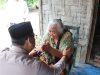 Kapolres Langkat Tunjukkan Kepedulian terhadap Lansia di Secanggang, Humanisme Polri Hadir di Tengah Masyarakat